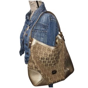 Michael Kors gold and tan purse.